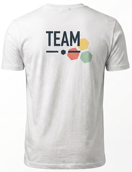 The backside of a white T-shirt with the lettering 'TEAM' on it, with a green, orange, and yellow hexagons in the background